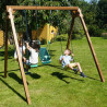 Portique balançoire en bois pour enfants installé dans un jardin