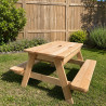 Table en bois pour enfant avec bac à sable intégré dans un jardin - Bac fermé