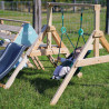 Área de juegos Olympe con tobogán y columpio instalada en el jardín