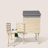 Cabaña de madera sobre pilotes con tobogán para niños – Joséphine